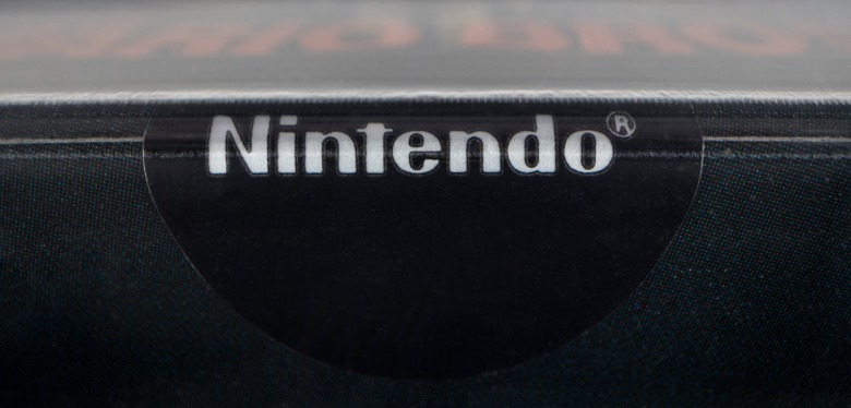 A Rare Sticker-Sealed Copy Of Super Mario Bros. Just Sold For $3 Million 1 A closeup of the glossy sticker seal for Super Mario Bros.