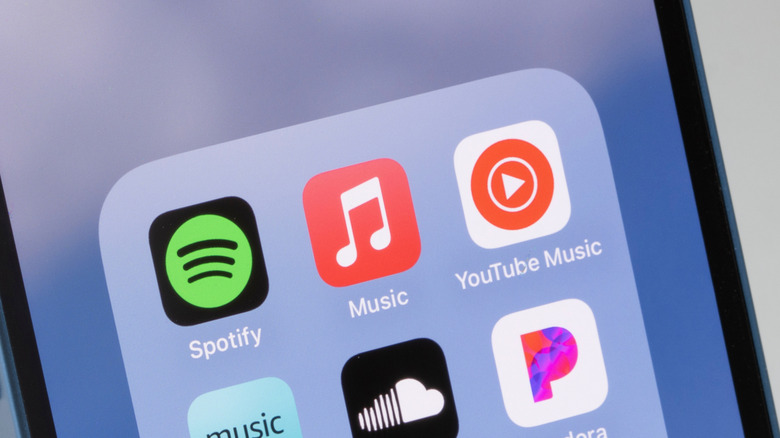 Assorted music streaming apps on an iPhone home screen