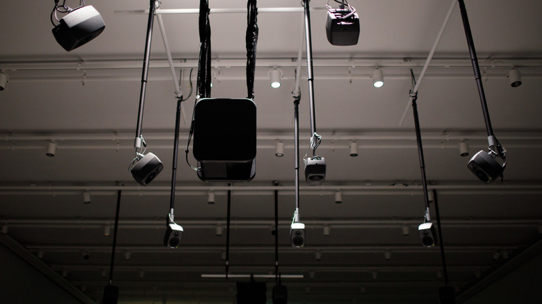 A nest of ceiling satellites for a Dolby Atmos system.